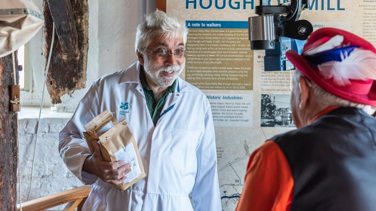 Volunteers with bags of flour